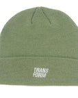 The Stacked Beanie Matcha mid-length, 100% acrylic, in green, perfect for snowboarding, features "TRANSFORM" logo